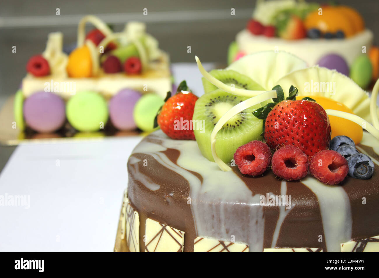 A Chocolate cake and topped with fresh fruit Stock Photo - Alamy