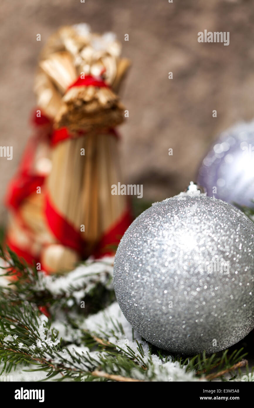 Silver Christmas bauble on a tree with snow Stock Photo - Alamy