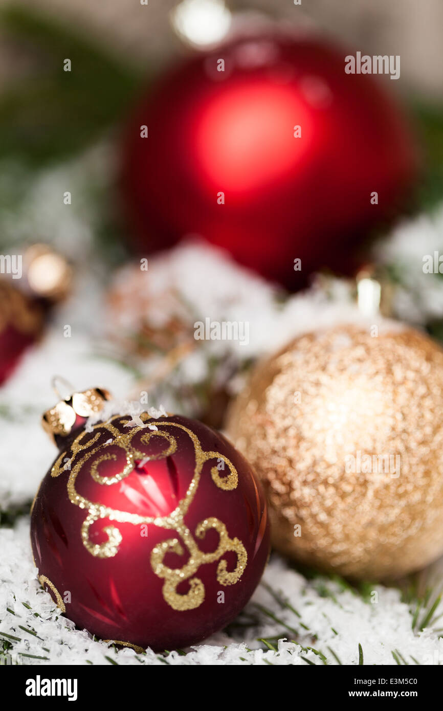 Christmas background with colourful shiny red and gold Xmas baubles ...