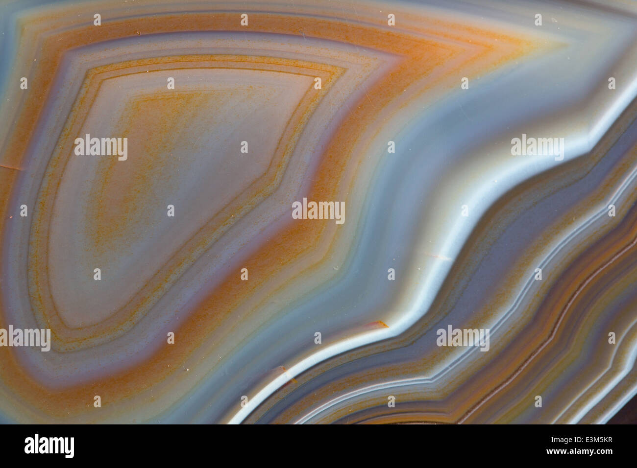 Polished blue agate rock showing diverse colouring and pattern Stock Photo