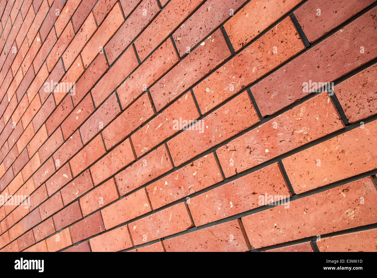 angle view red brick wall, square format Stock Photo