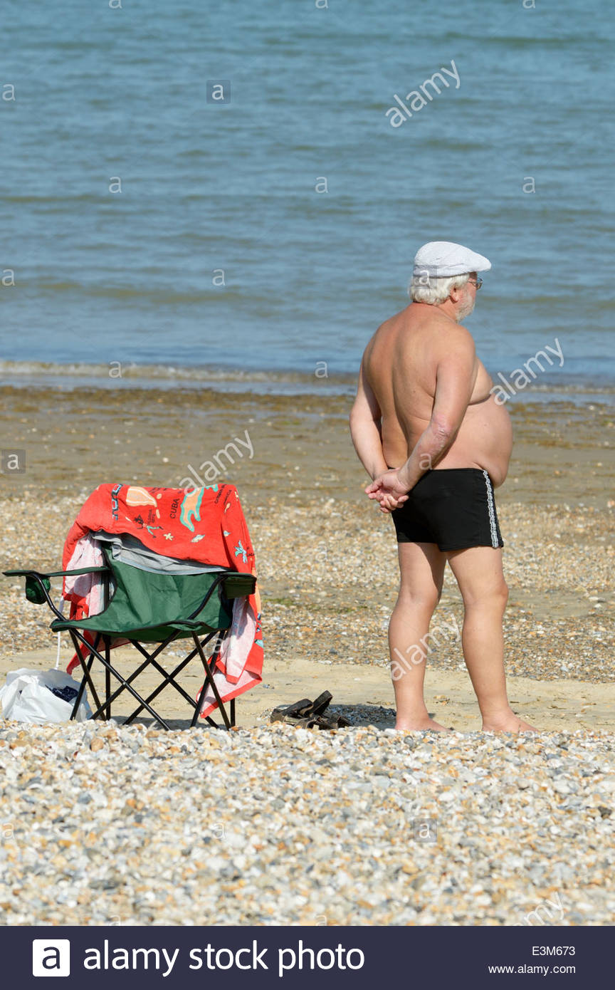 fat old man in swim trunks