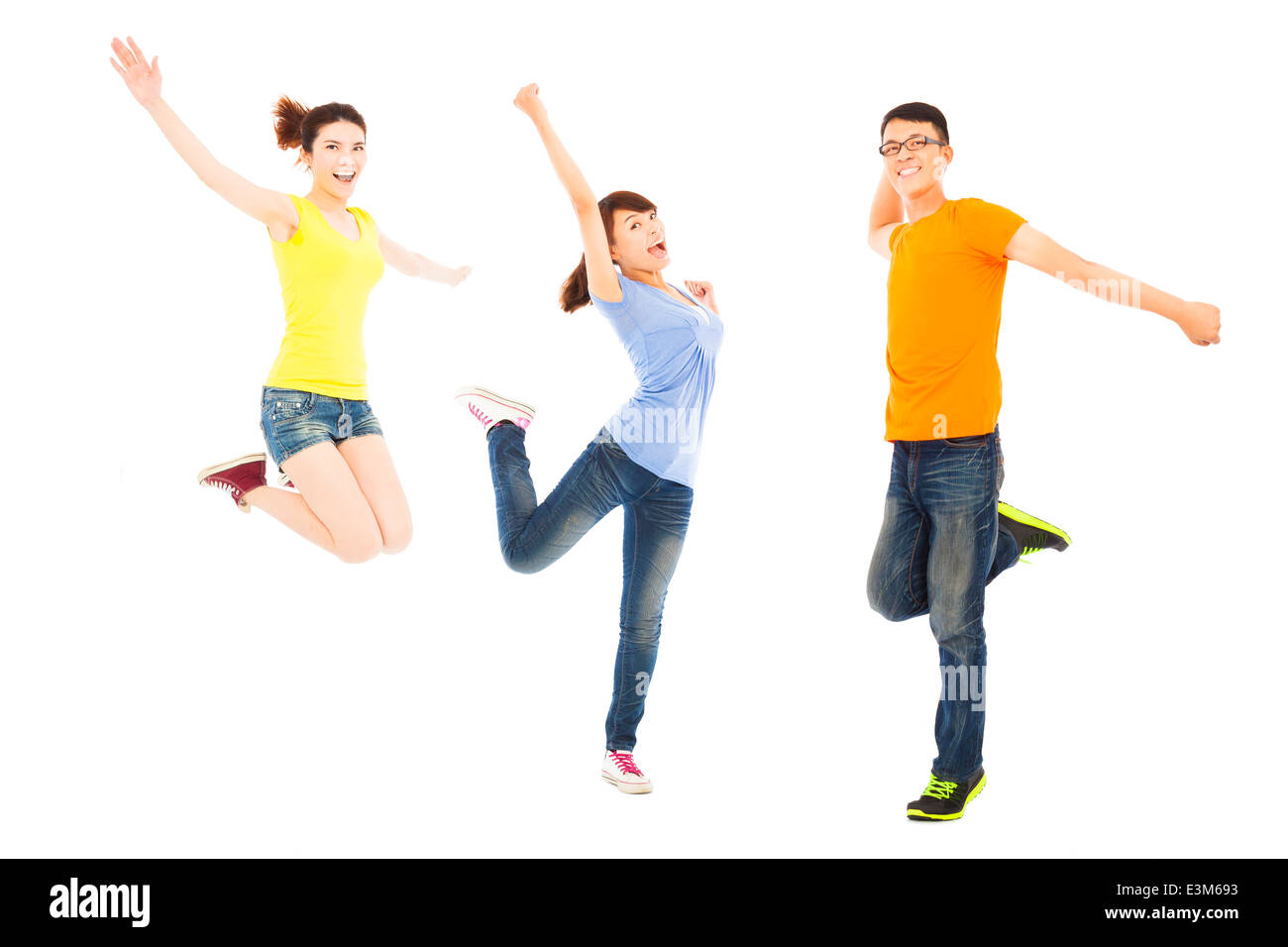 happy young people dancing and jumping Stock Photo