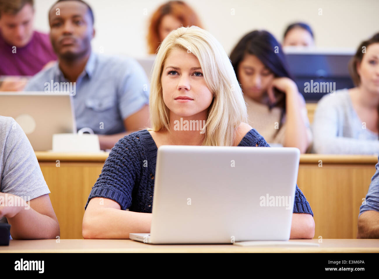 Female University Student Using Laptop In Lecture Stock Photo - Alamy