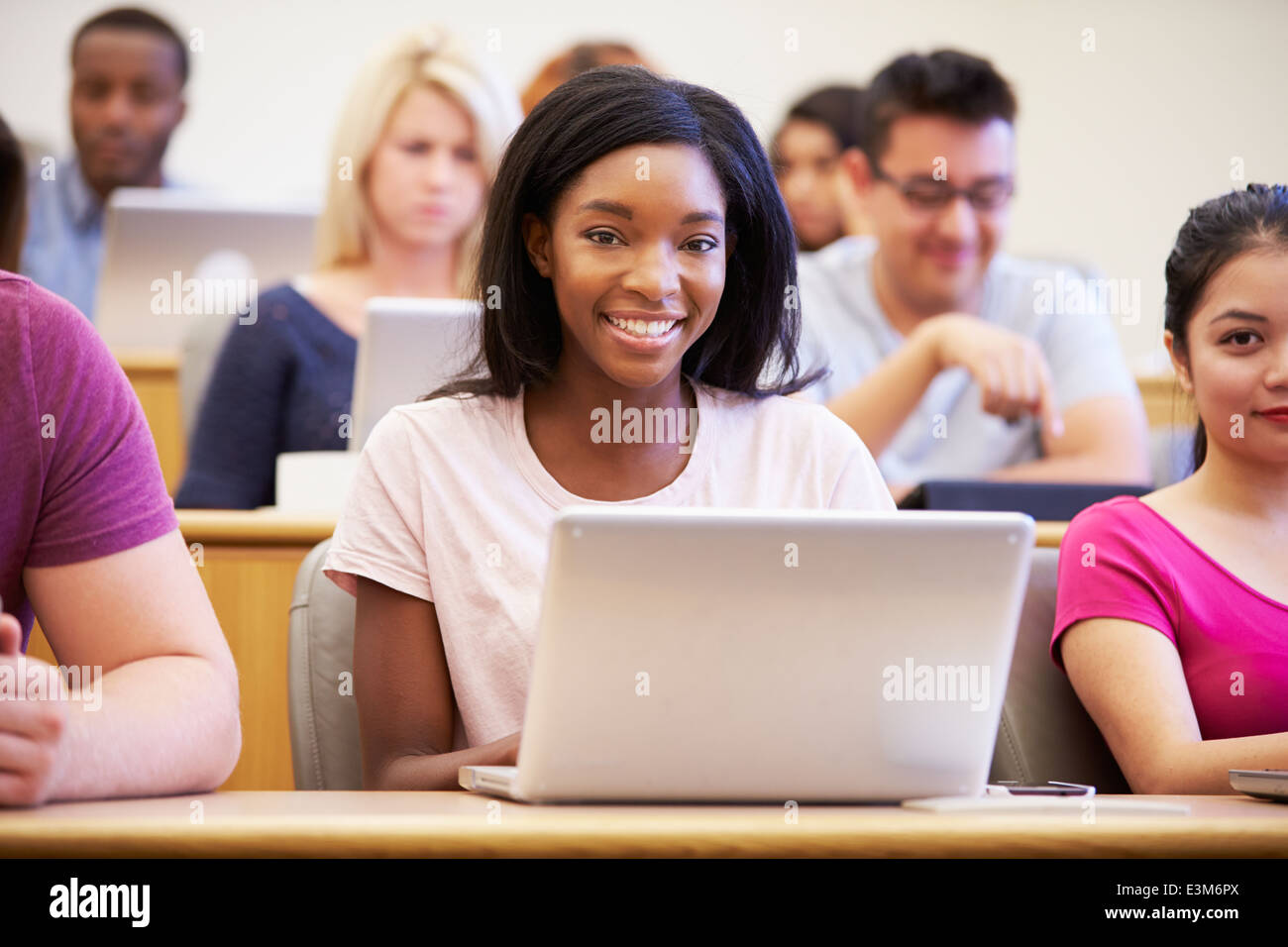 Female University Student Using Laptop In Lecture Stock Photo - Alamy