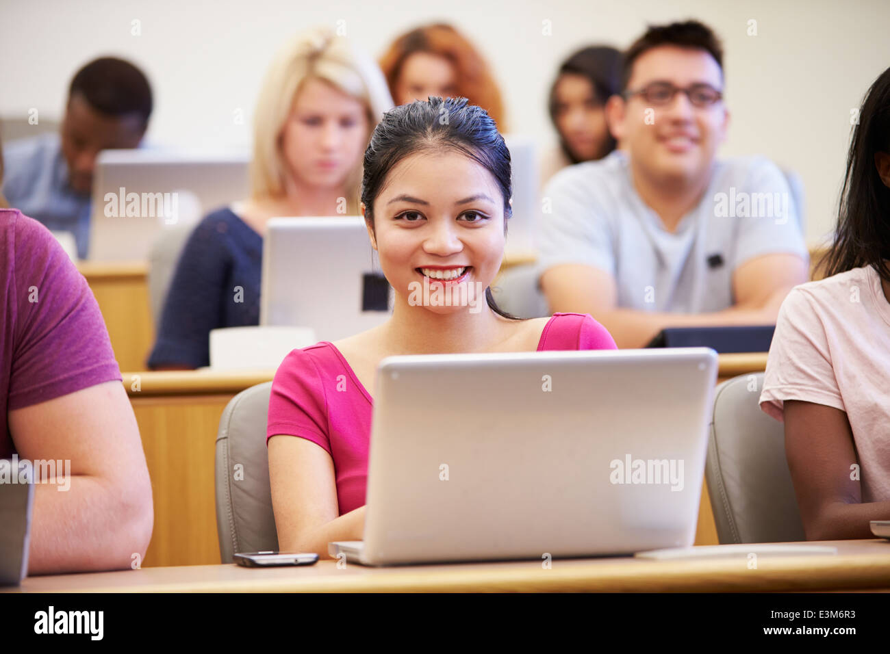 Female University Student Using Laptop In Lecture Stock Photo - Alamy