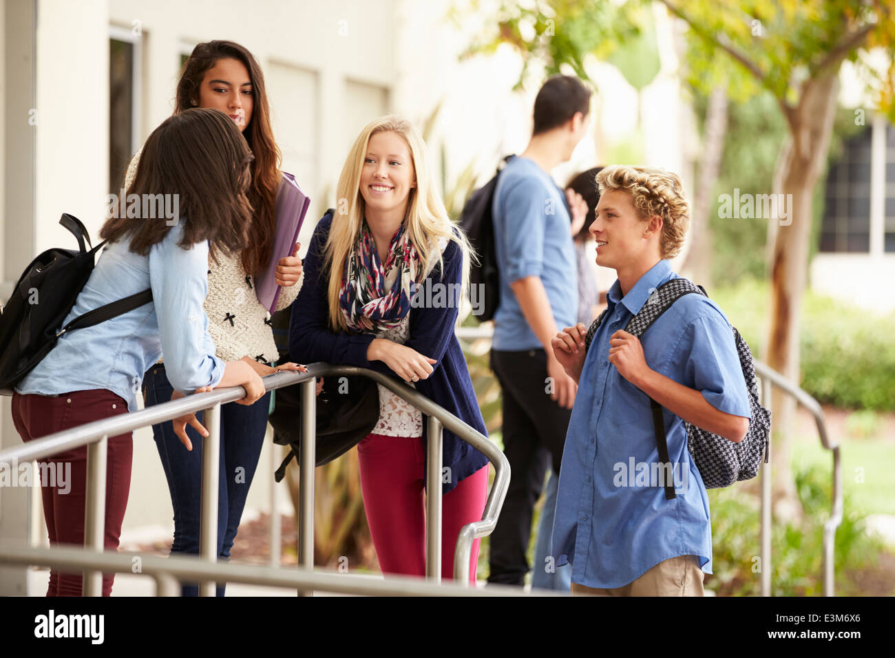 Group Of High School Students Standing Outside Building Stock Photo - Alamy