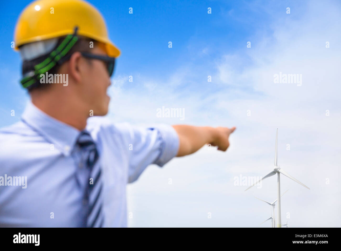 professional engineer point the wind generator Stock Photo
