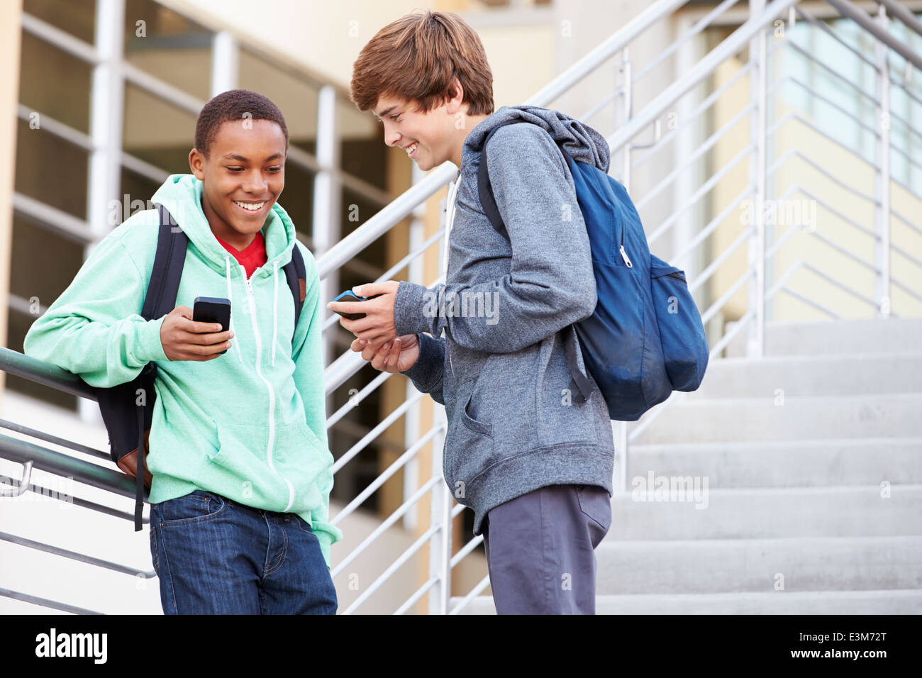 Two friends talking school hi-res stock photography and images - Alamy