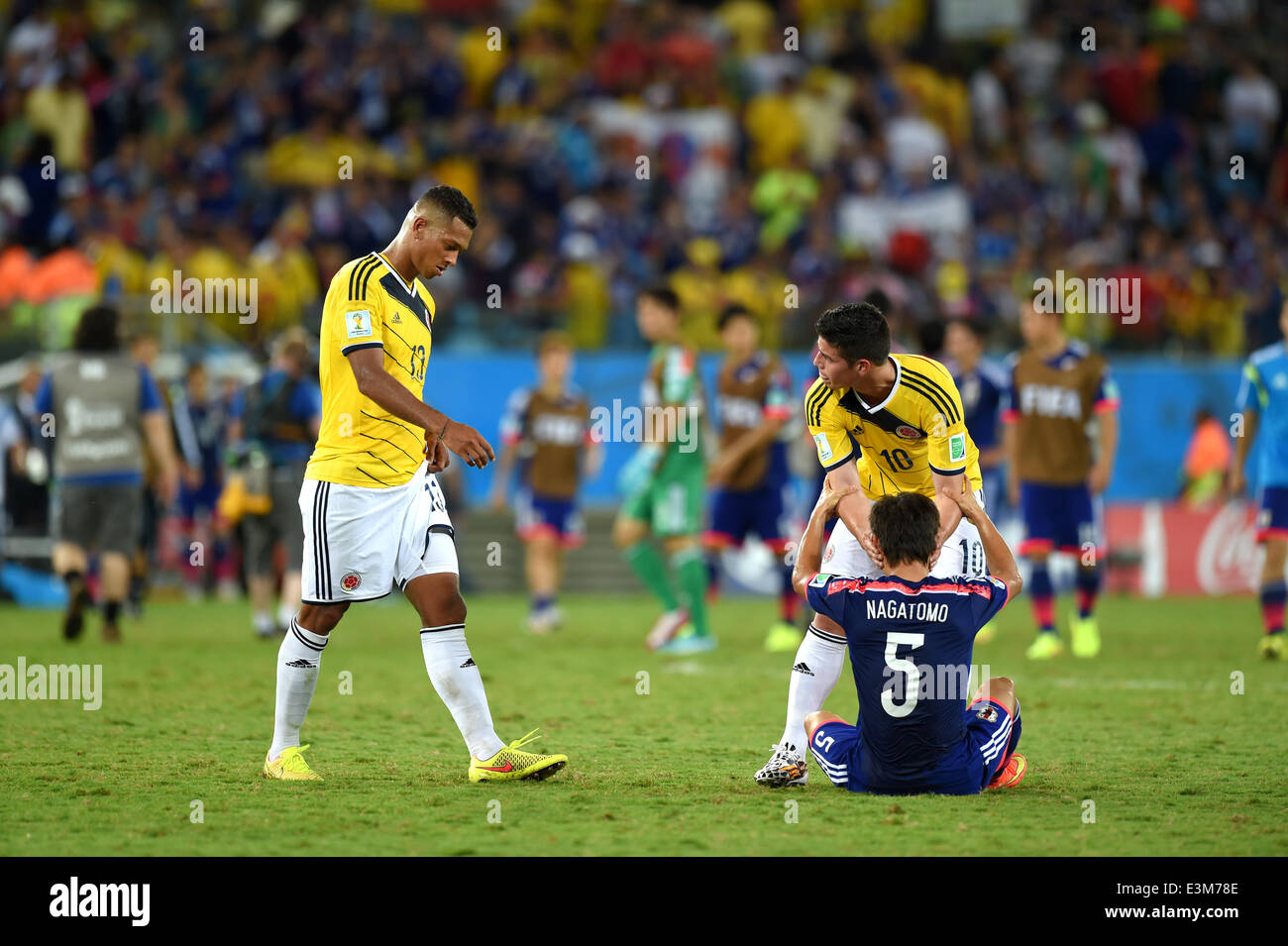 Cuiaba, Brazil. 24th June, 2014. Fredy Guarin, James Rodriguez (COL), Yuto Nagatomo (JPN) Football /Soccer : FIFA World Cup Brazil 2014 Group C match between Japan and Colombia at Arena Pantanal in Cuiaba, Brazil . Credit:  FAR EAST PRESS/AFLO/Alamy Live News Stock Photo