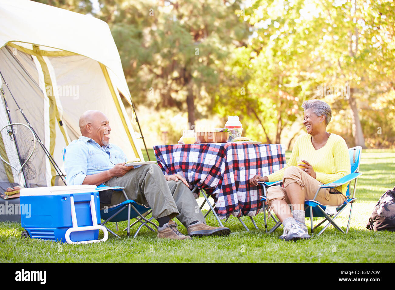 Senior Couple Enjoying Camping Holiday In Countryside Stock Photo