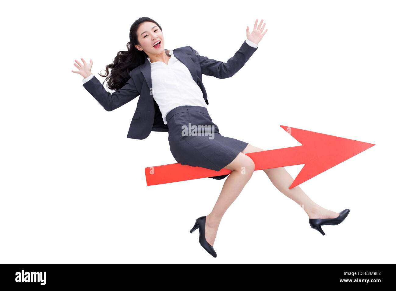 Businesswoman with red arrow sign Stock Photo - Alamy