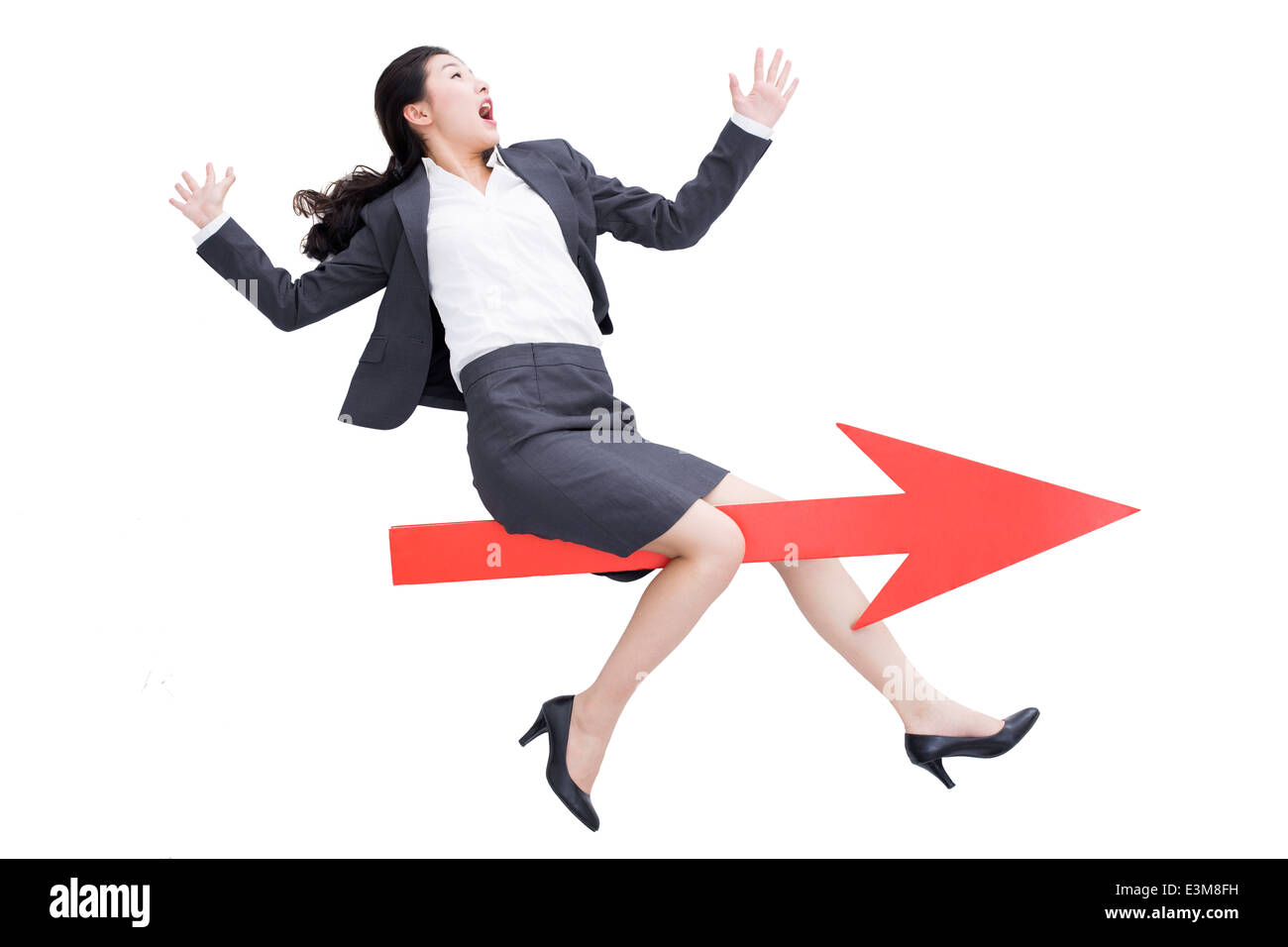 Businesswoman with red arrow sign Stock Photo - Alamy