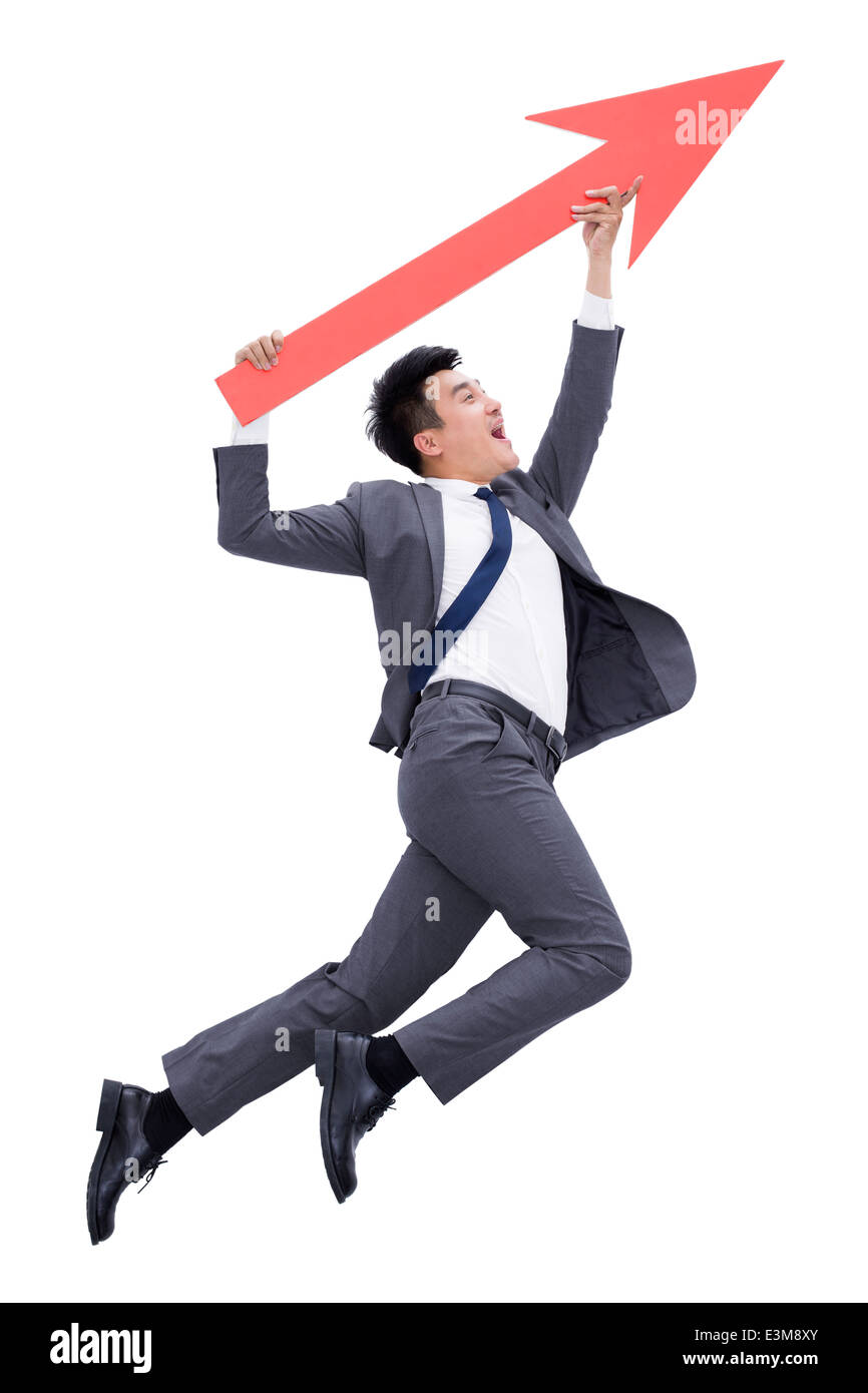 Businessman with red arrow sign Stock Photo - Alamy