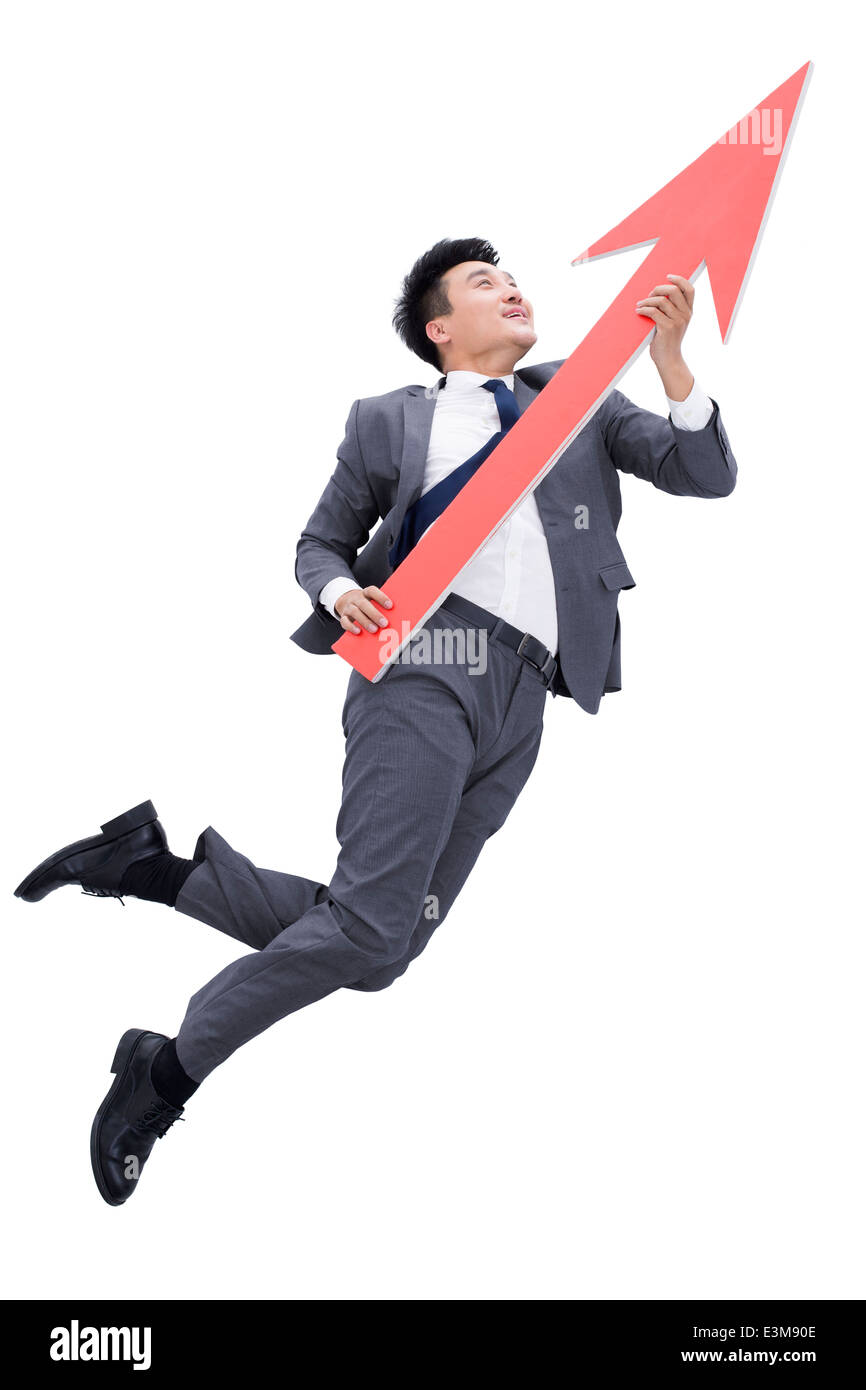 Businessman with red arrow sign Stock Photo - Alamy