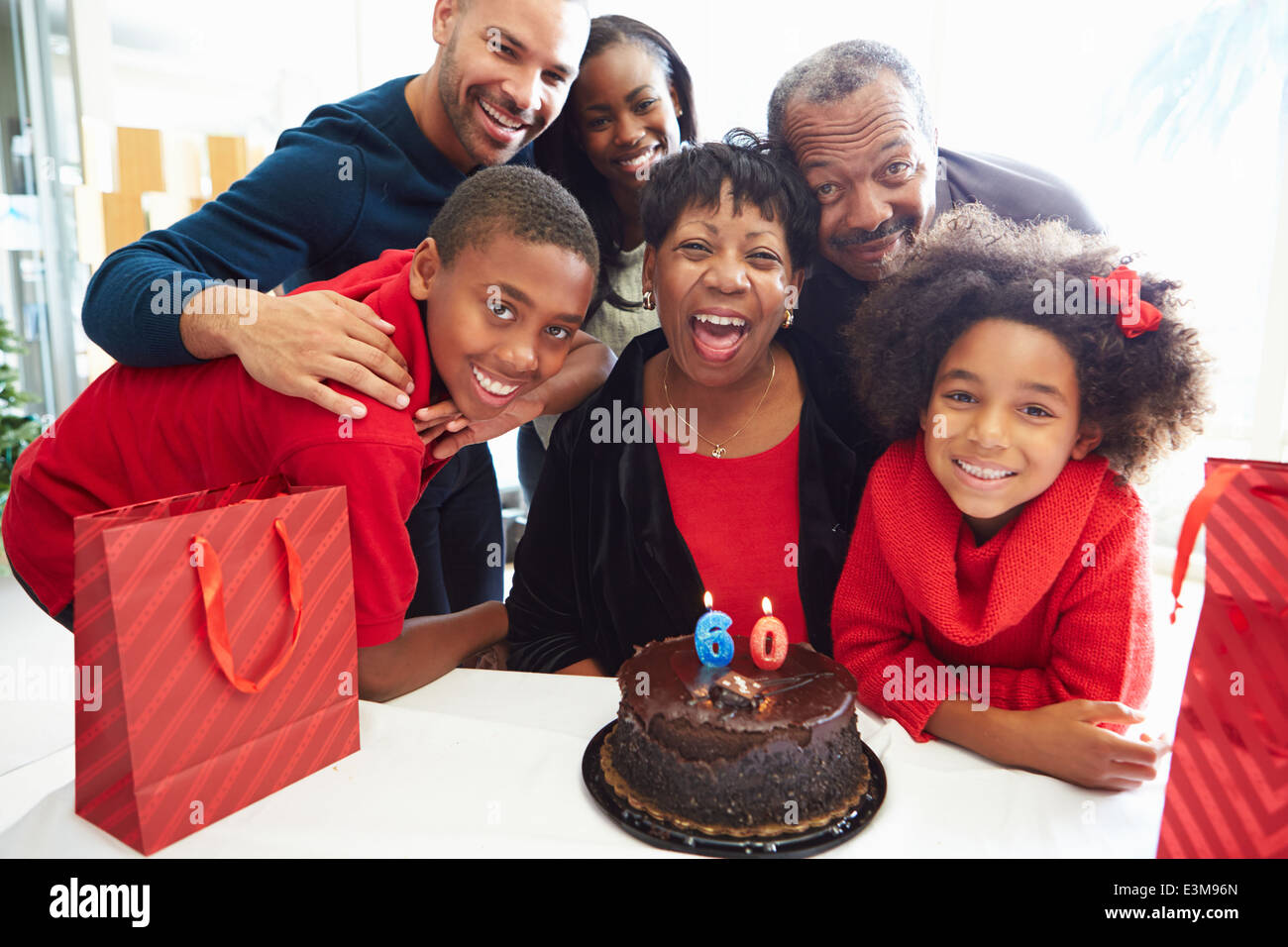 Family Celebrating 60th Birthday Together Stock Photo