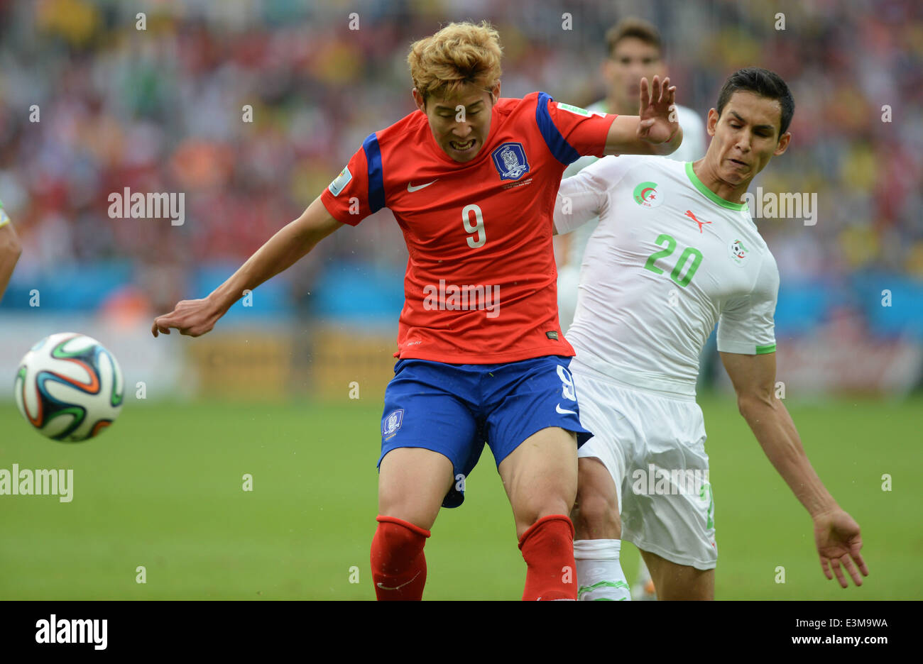 Porto Alegre, Brazil. 22nd June, 2014. Son Heung-Min (KOR), Aissa Mandi (ALG) Football/Soccer : FIFA World Cup Brazil 2014 Group H match between South Korea 2-4 Algeria at Estadio Beira-Rio in Porto Alegre, Brazil . © SONG Seak-In/AFLO/Alamy Live News Stock Photo