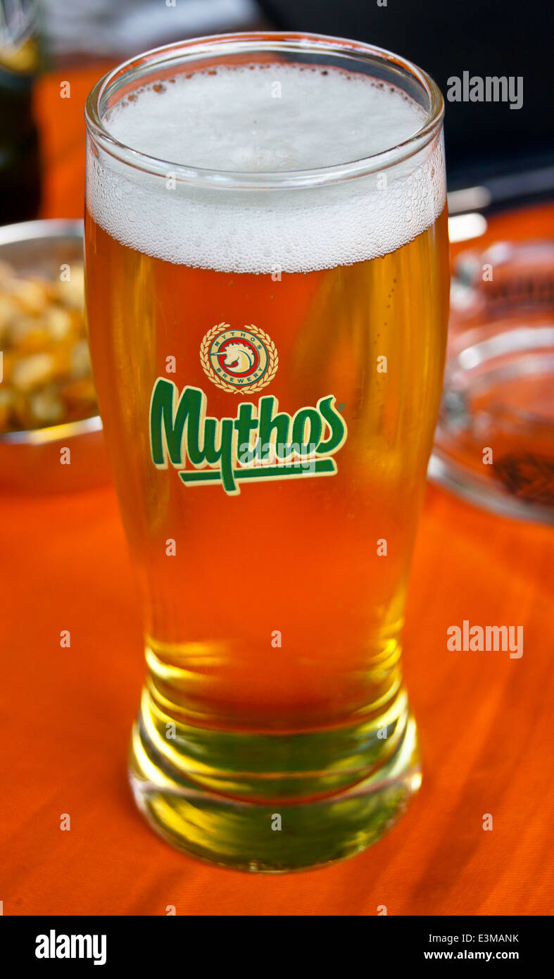 A glass of Mythos Greek beer on a bar on Kos, Greece Stock Photo