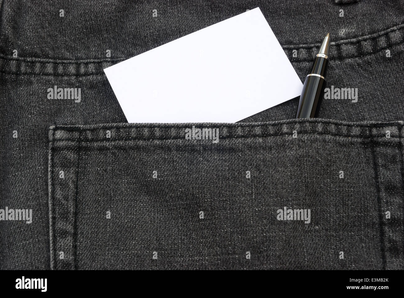 blank business card and ball point in jean back pocket Stock Photo