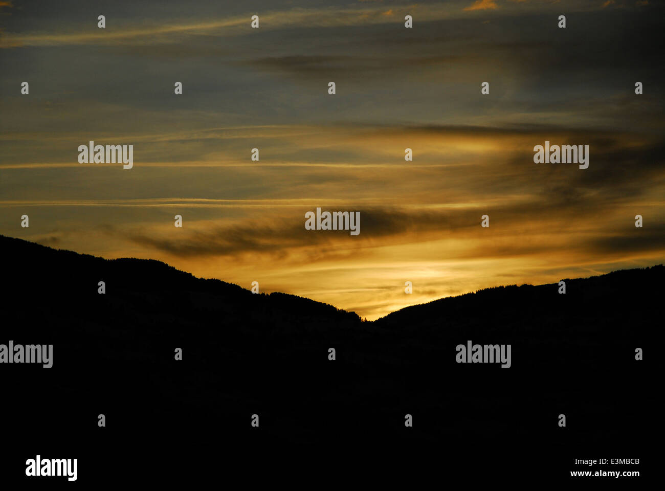 Hilly landscape at sunset hi-res stock photography and images - Alamy