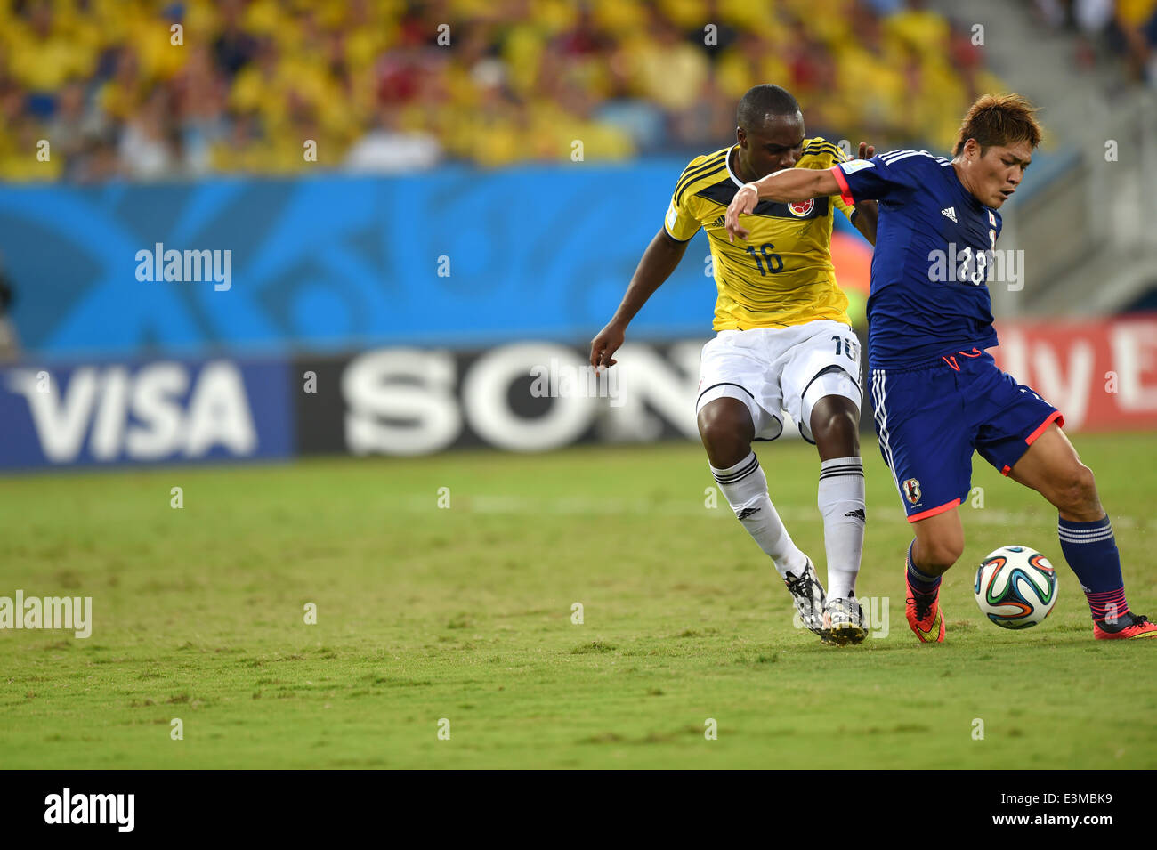 Cuiaba, Brazil. 24th June, 2014. Eder Alvarez Balanta (COL), Yoshito Okubo (JPN) Football/Soccer : FIFA World Cup Brazil 2014 Group C match between Japan 1-4 Colombia at Arena Pantanal in Cuiaba, Brazil . Credit:  FAR EAST PRESS/AFLO/Alamy Live News Stock Photo