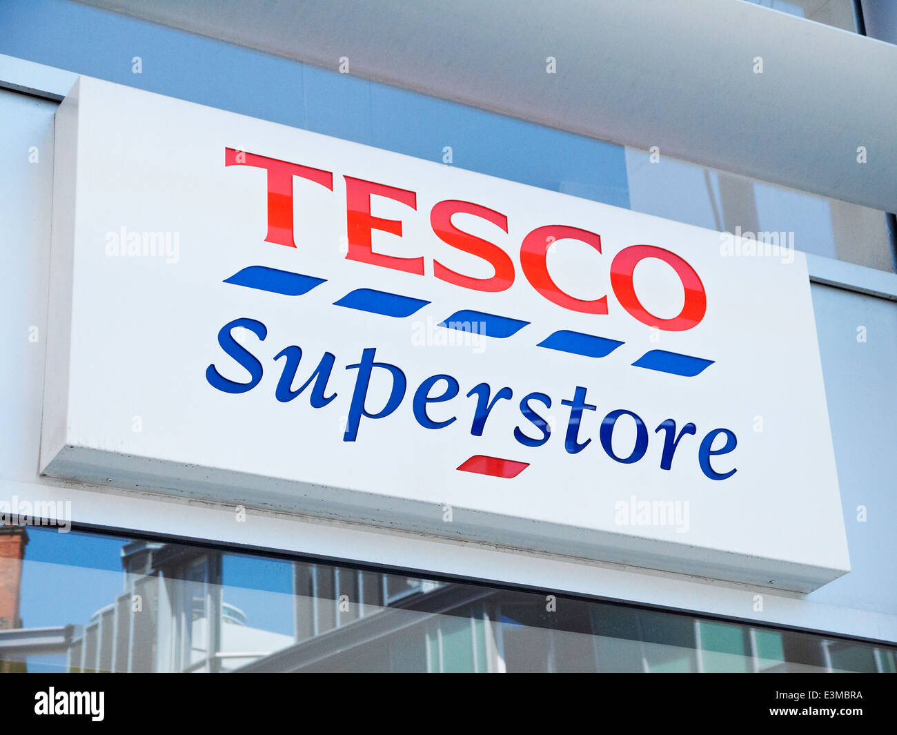 Tesco Superstore sign on outside wall UK Stock Photo