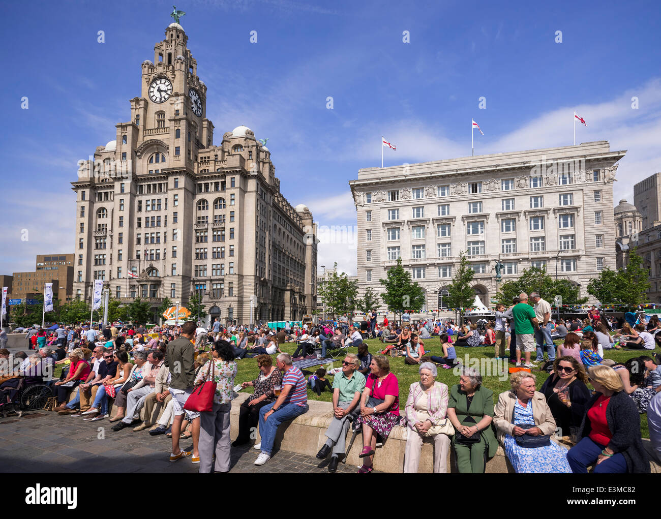 A busy Liverpool pierhead waterfront with the Liver building and Cunard building (right) during the river festival 2014. Stock Photo