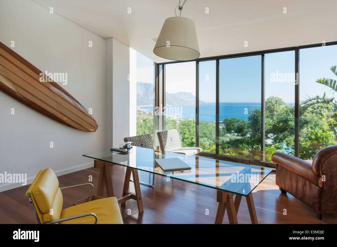 Modern home office with ocean view Stock Photo