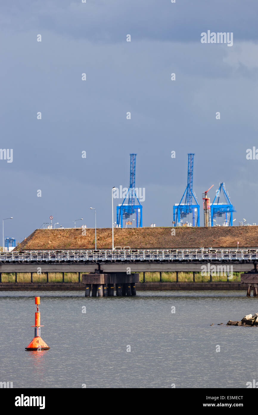 Port quay with buoy and gantry crane in the background Stock Photo - Alamy