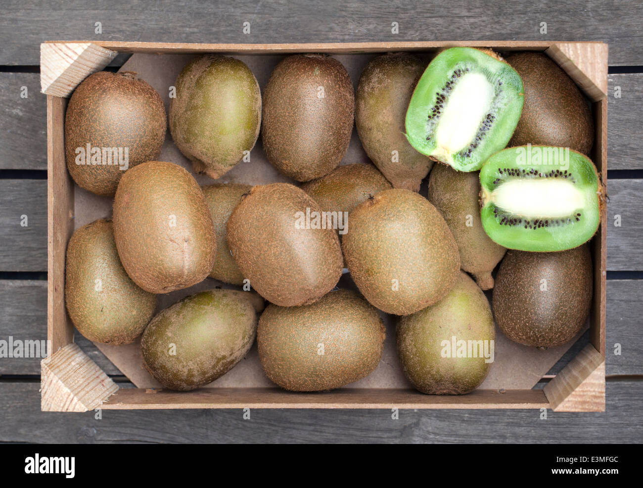 Wooden box of fresh Box of kiwis Stock Photo