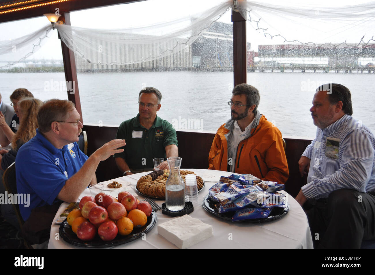 Paul Glander (USFWS Federal Aid Coordinator) discusses the National Coastal Wetlands Conservation Program with tour members. USFWS Photo. Stock Photo