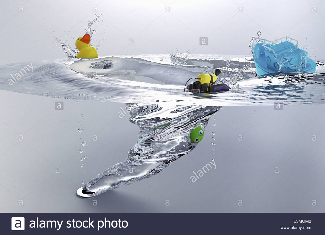 Bath Toys And Diver Sinking In Whirlpool Of Drain Plughole