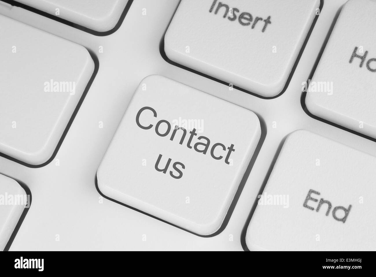 Contact us keyboard button close-up Stock Photo