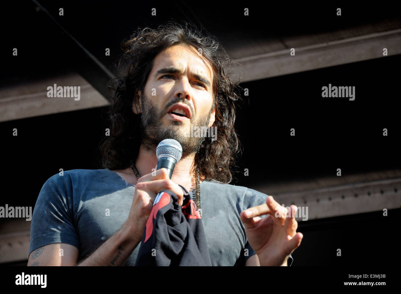 Russell Brand, comedian, speaking at The People's Assembly demonstration against Austerity, Parliament Sq, 21st June 2014 Stock Photo