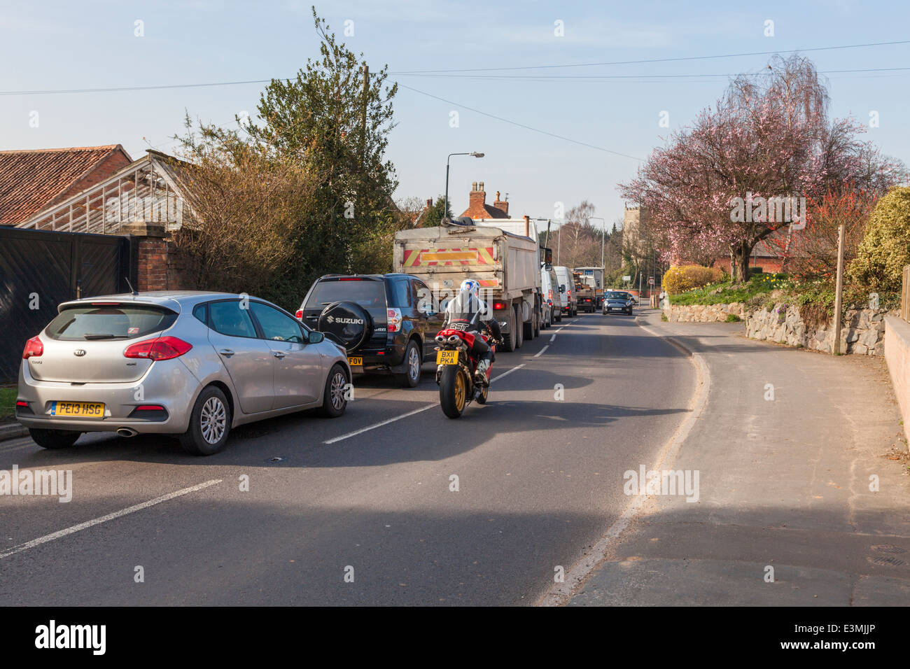 Traffic queue through the small village of Rempstone, Nottinghamshire, England, UK Stock Photo