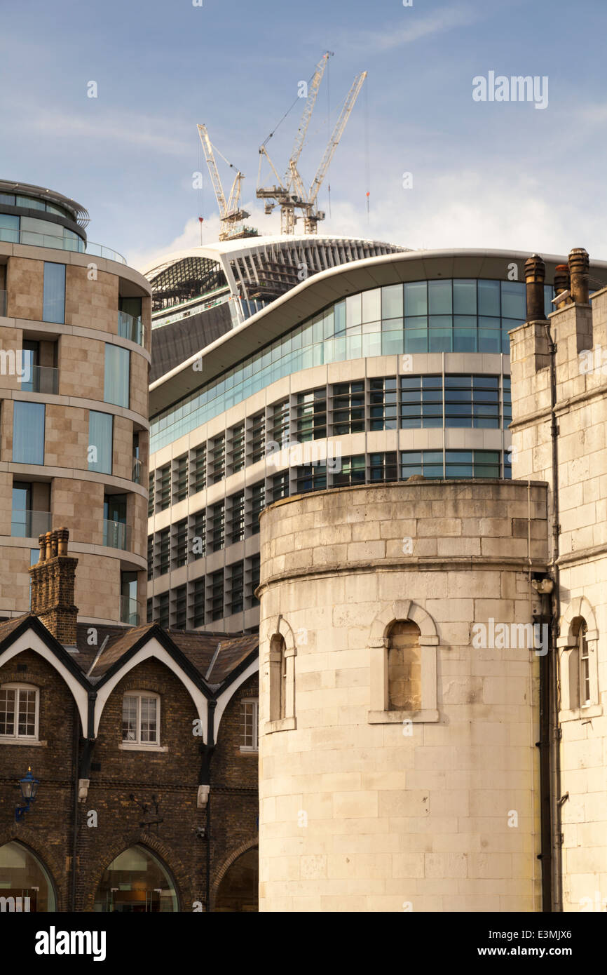 Mix of old and new buildings and architectural styles at the Tower of London in the City of London Stock Photo