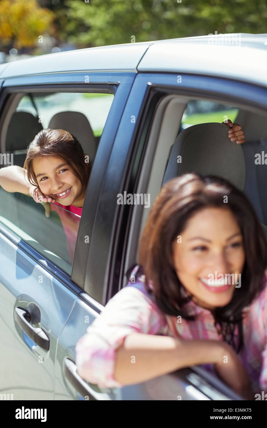 Portrait of smiling mother and daughter in car Stock Photo