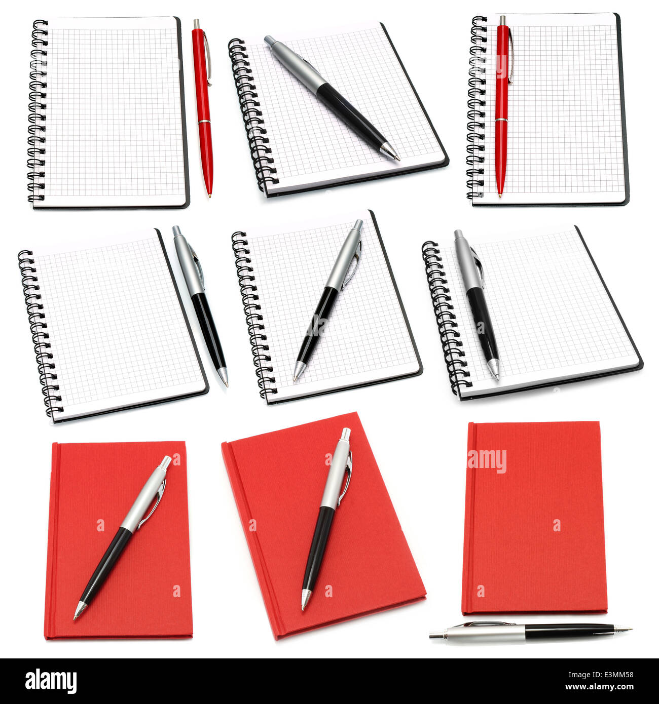 Notepads with ball pens on a white background Stock Photo - Alamy