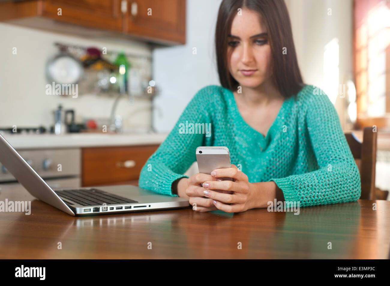Young woman working at home Stock Photo