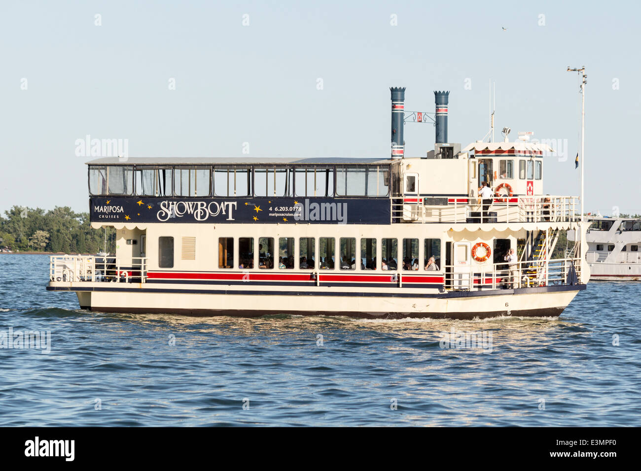 The tourist cruise boat Showboat taking tourists on a tour of the Toronto  Islands on Lake Ontario Stock Photo - Alamy