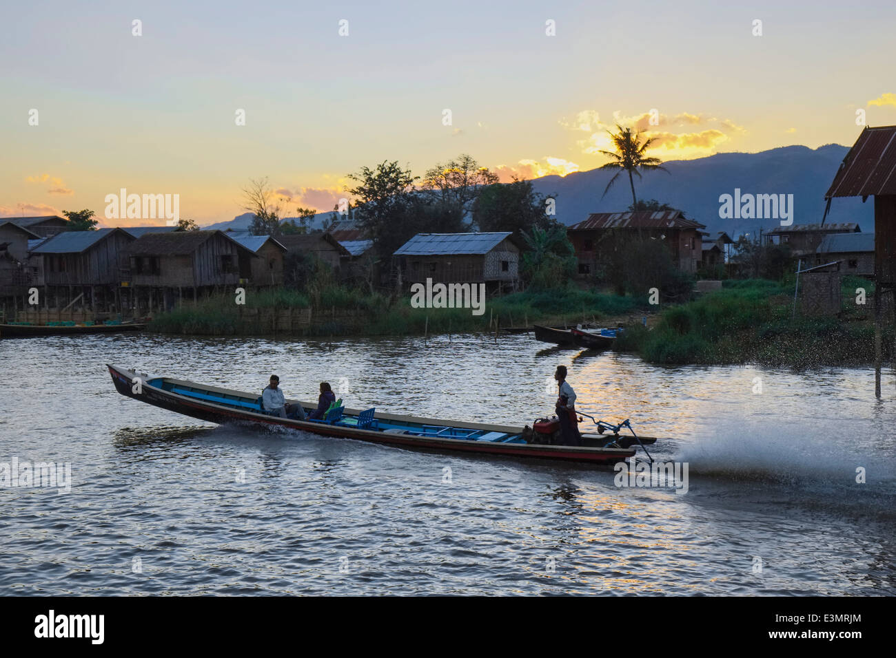 Longboat on canal to Inle Lake, Nyaung Shwe, Myanmar, Asia Stock Photo