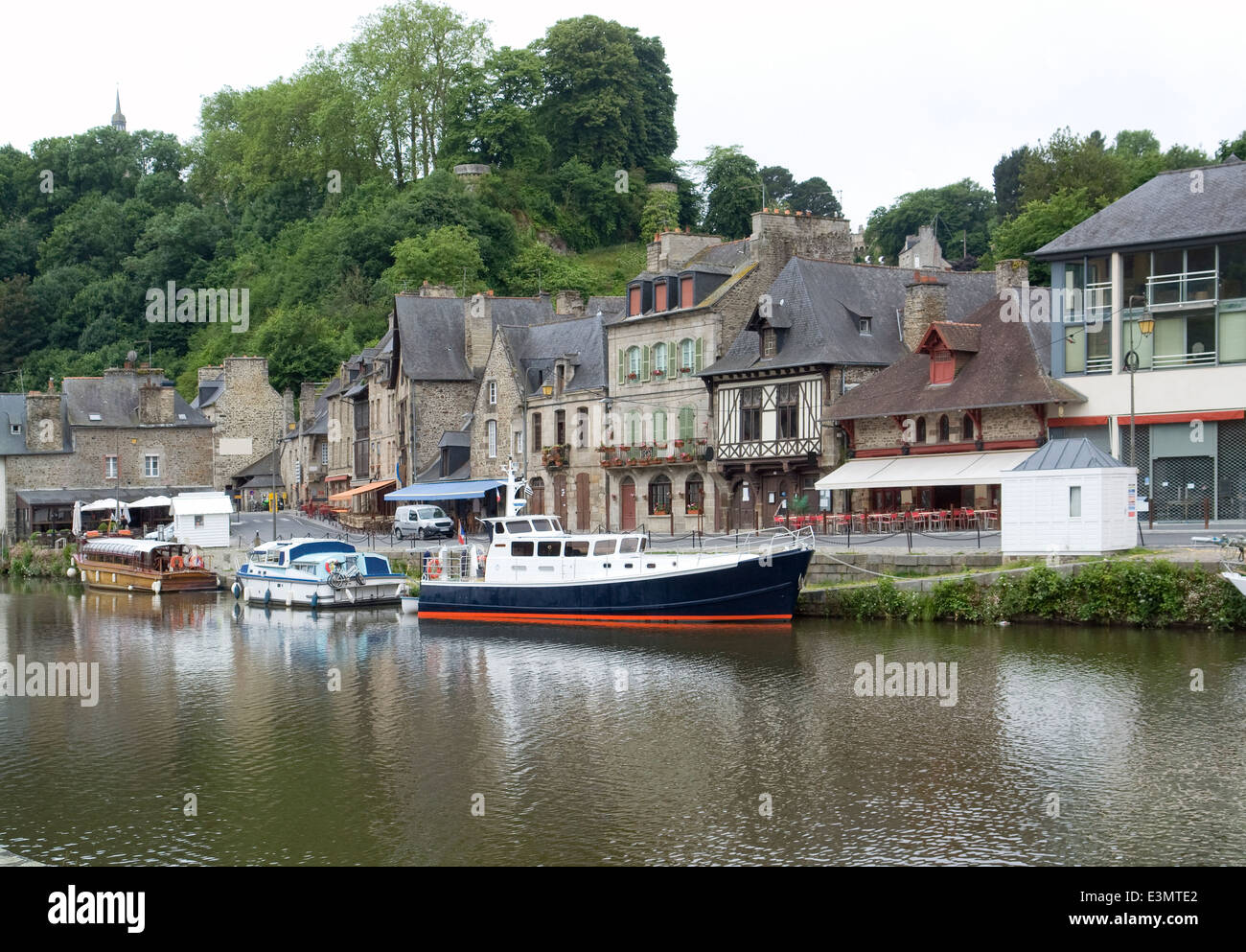 Idyllic scenery at the port of Dinan, a town in Brittany, France. It is located at the river Rance Stock Photo