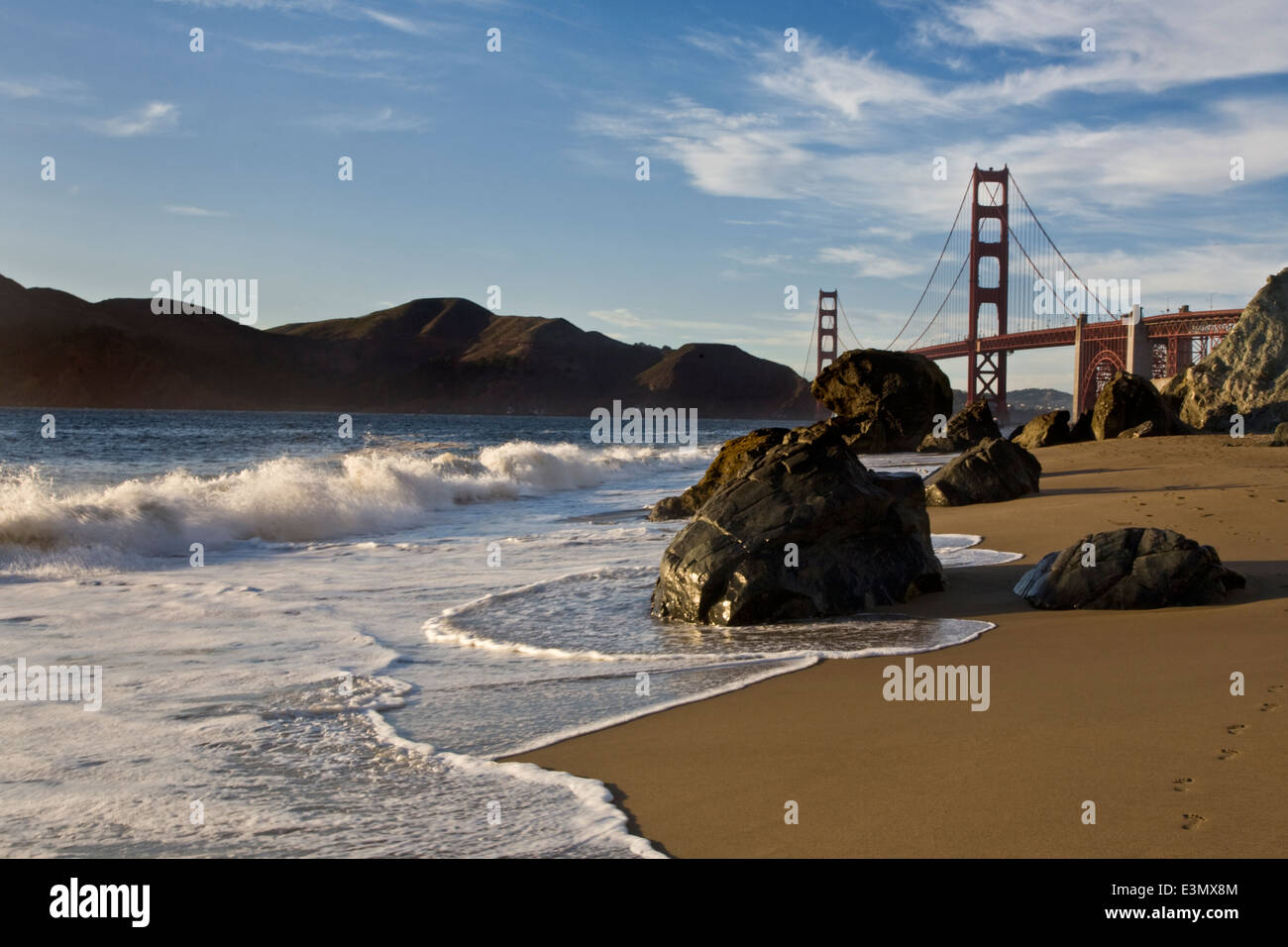 THE GOLDEN GATE BRIDGE as seen from BAKER BEACH - SAN FRANCISCO, CALIFORNIA Stock Photo