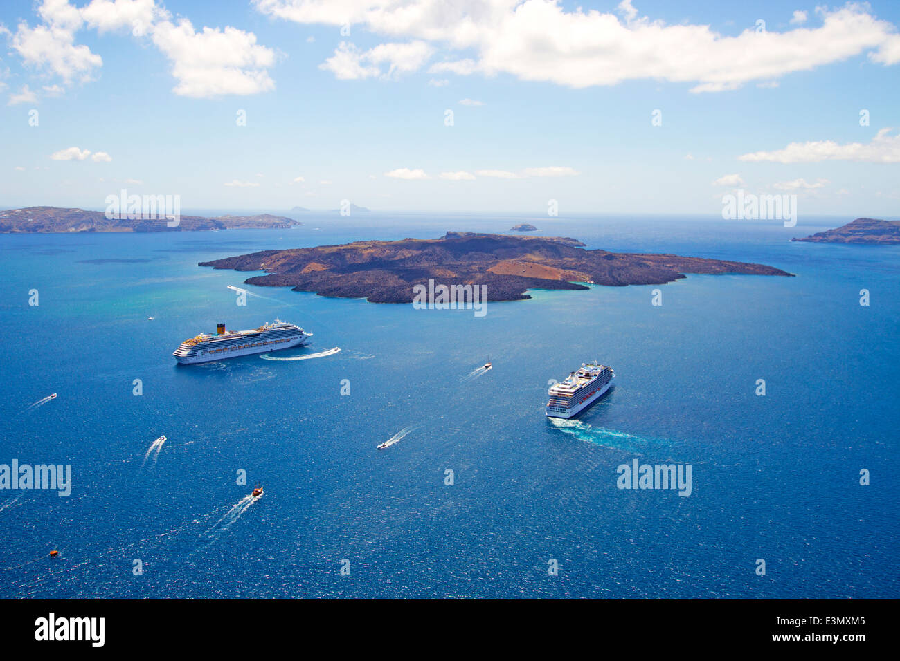 Cruise ships,boats around Caldera volcano,Santorini,Greece Stock Photo