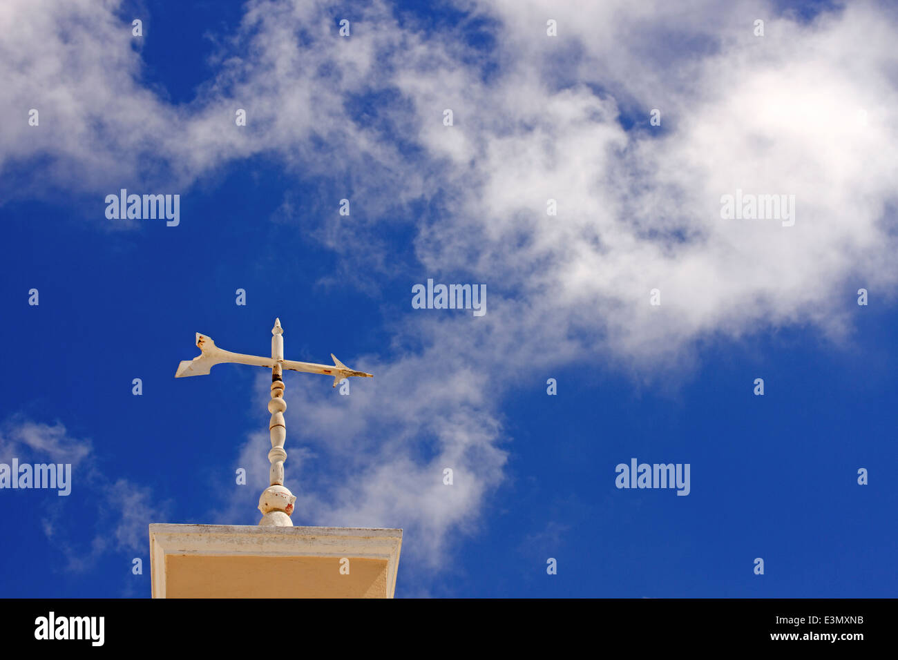 An arrow points to the east with blue sky background Stock Photo