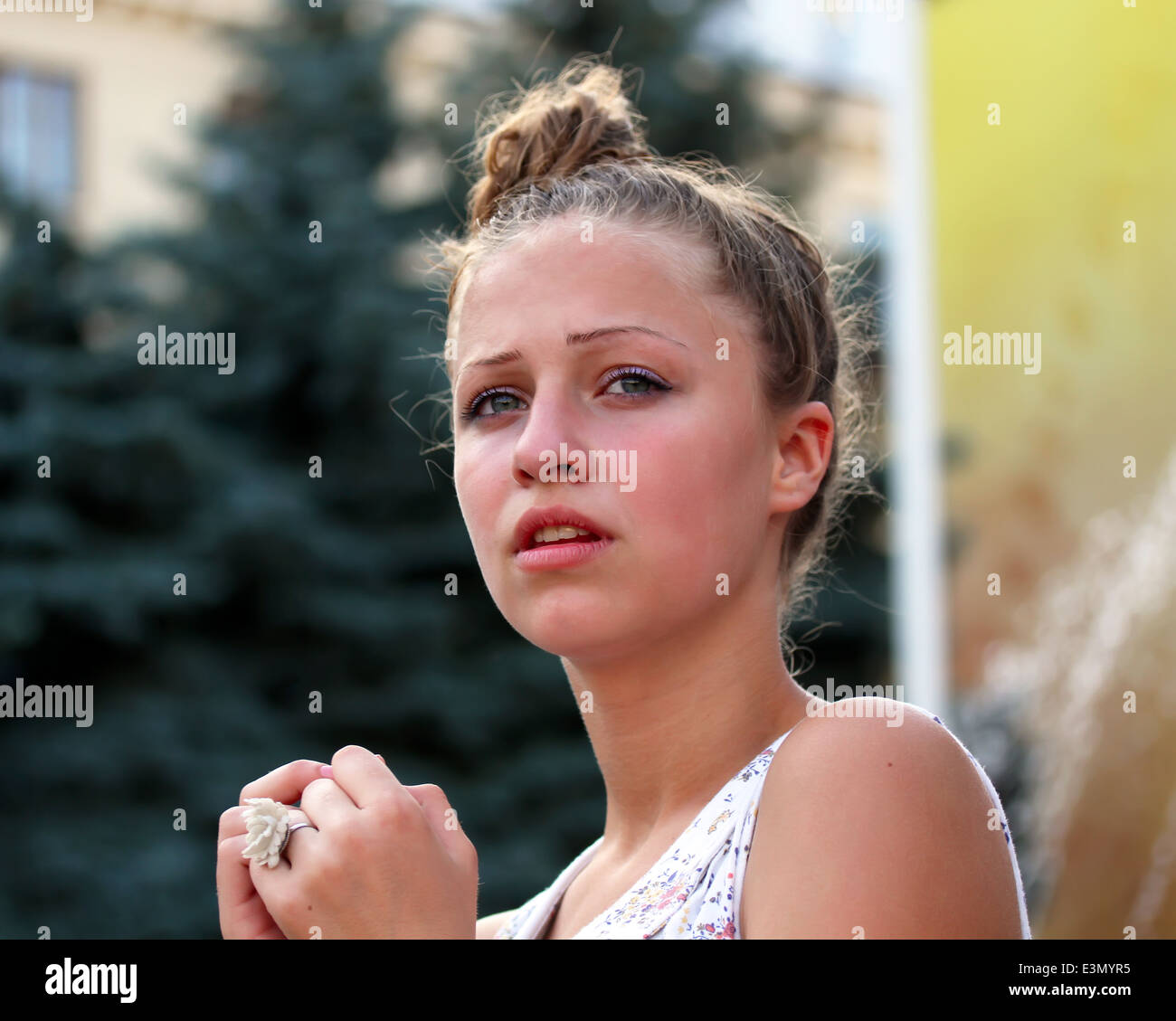 Portrait of beautiful funny girl in the city. Stock Photo