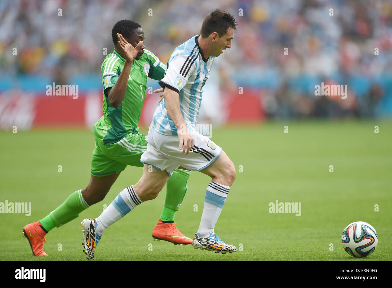 Porto Alegre, Brazil. 25th June, 2014. PORTO ALEGRE BRAZIL -15 Jun: Leo Messi and Ahmed Musa in the match between Argentina and Nigeria, corresponding to the group F of the World Cup 2014, played at the Beira Rio stadium, on June 25, 2014. Photo: Edu Andrade/Urbanandsport/Nurphoto Credit:  Edu Andrade/NurPhoto/ZUMAPRESS.com/Alamy Live News Stock Photo