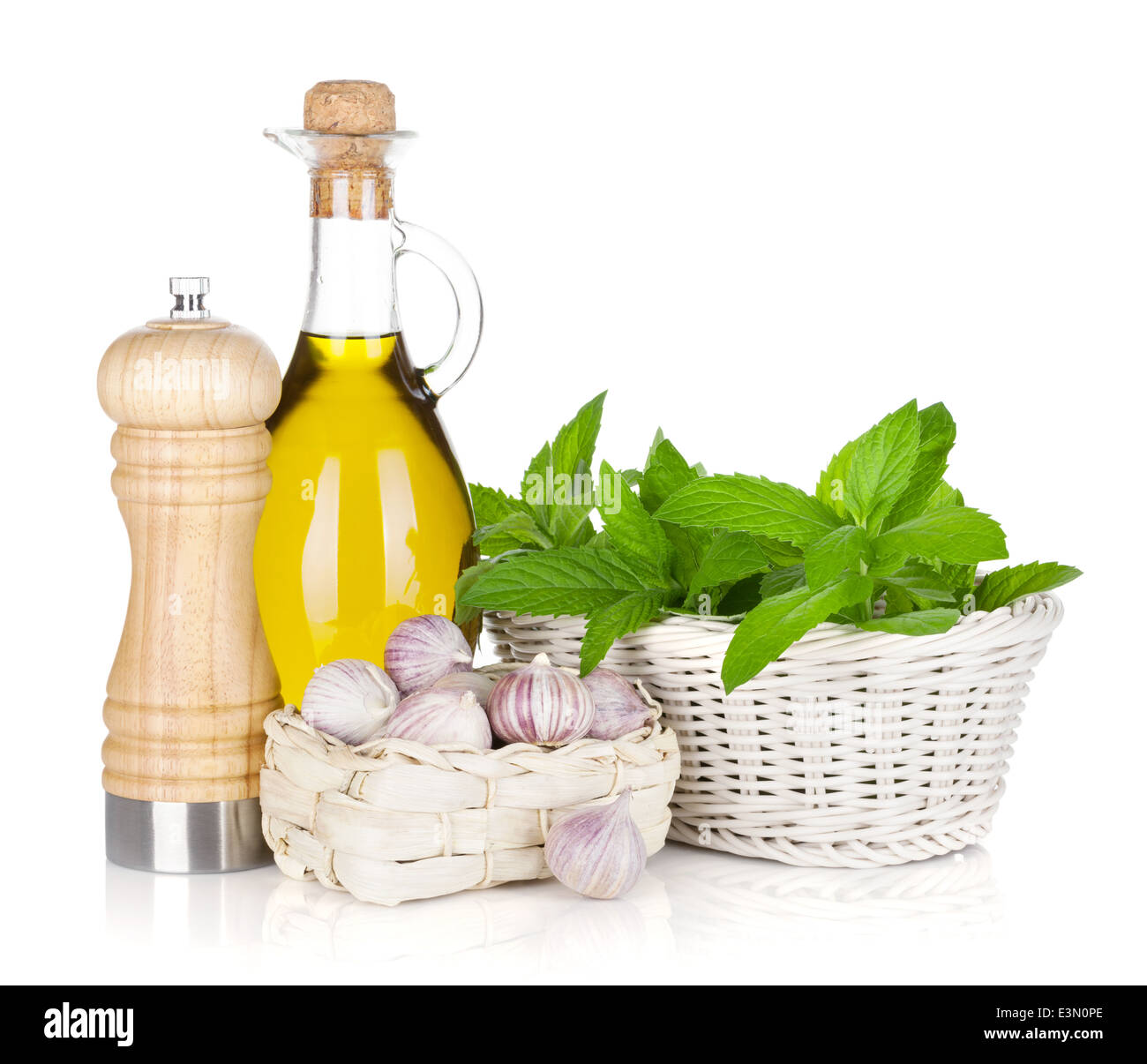 Fresh herbs, olive oil and pepper shaker. Isolated on white background Stock Photo Alamy