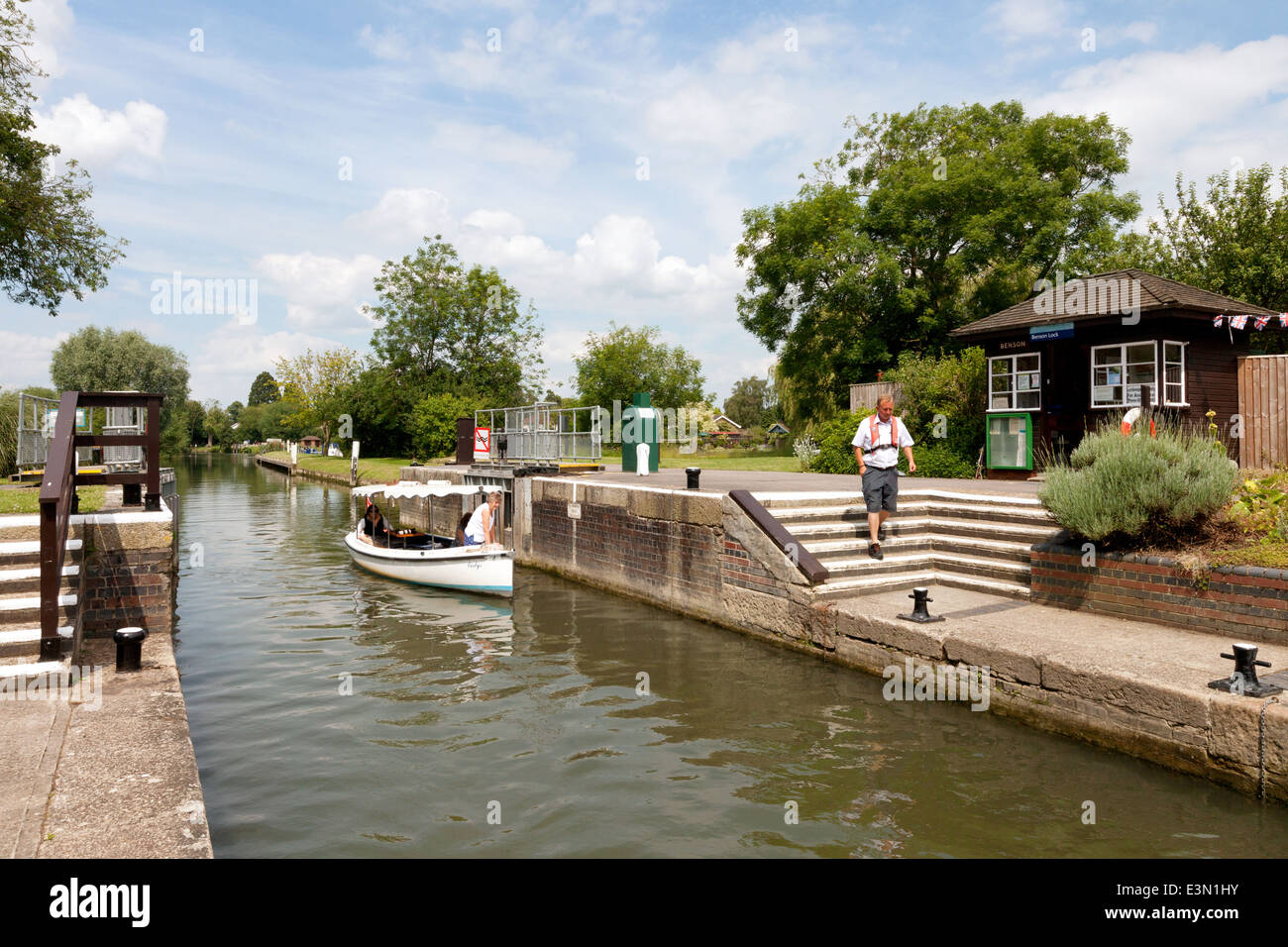Boat entering a lock on the river Thames; Benson Lock, Oxfordshire