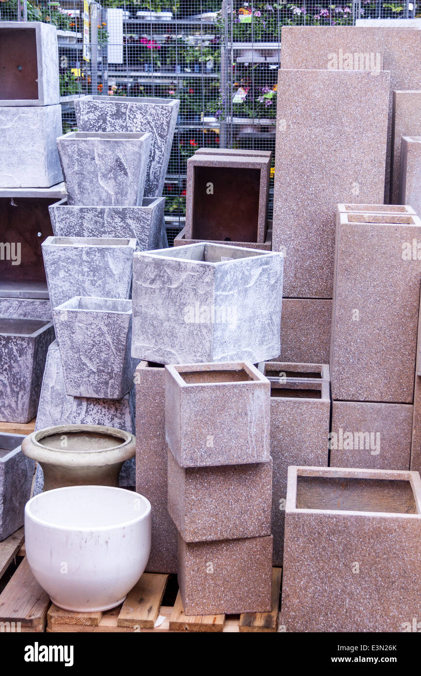 Glazed and unglazed ceramic flower pots in a variety of sizes and